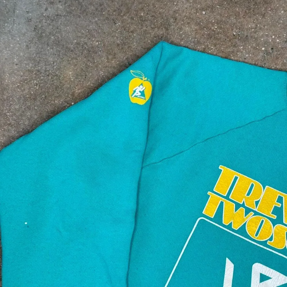 Vintage Adidas Trevira crewneck in teal‎ with bold graphic. Made in USA